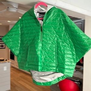Think Royln green puffer poncho.
